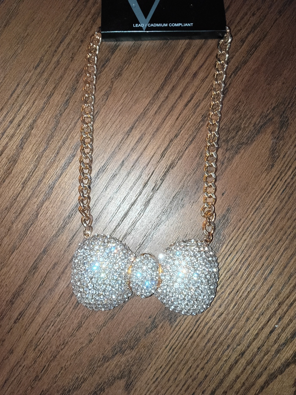 Gold Chain Necklace with Sparkling Crystal Bow Pendant